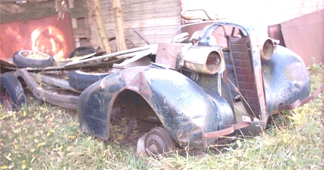 1937 Buick chassis Frame, with old motor in it, on 3 wheel rims ,front fenders,Firewall with Dash