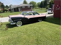 1955 Ford Crown Vic. Tropical rose and black outside. Black and white inside Continental kid . 